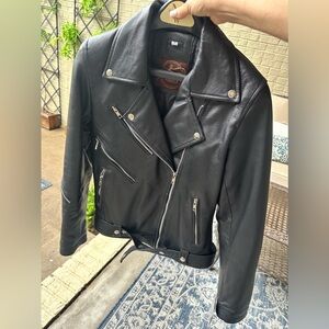 NWT women’s small REAL leather motorcycle jacket.